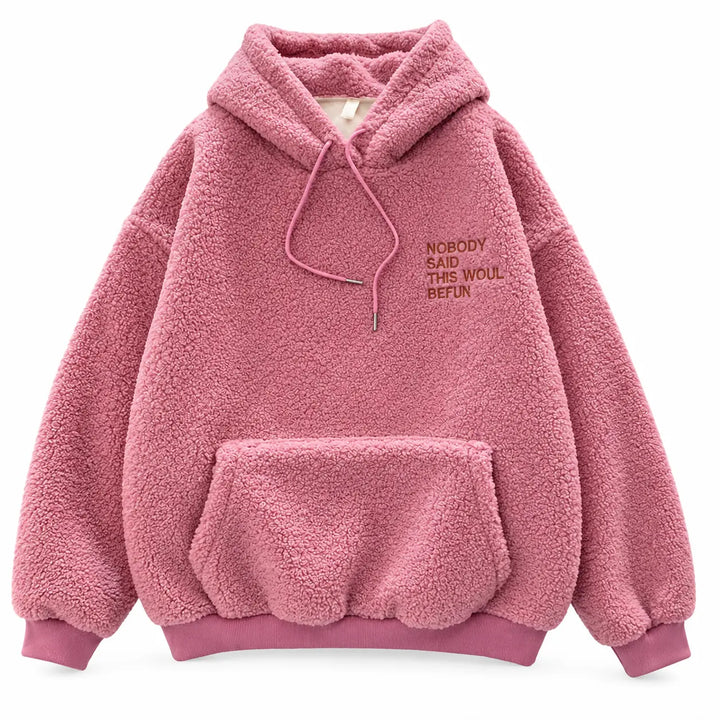 Pink fleece pullover shown in a front product view, showing the drawstring hood and front pocket, against a white background.