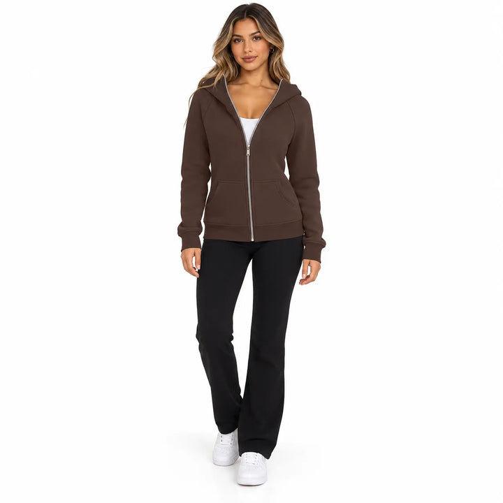 Full-body model wearing the Chocolate Brown zip hoodie, showing a front zipper, hood and ribbed cuffs, on a white background.