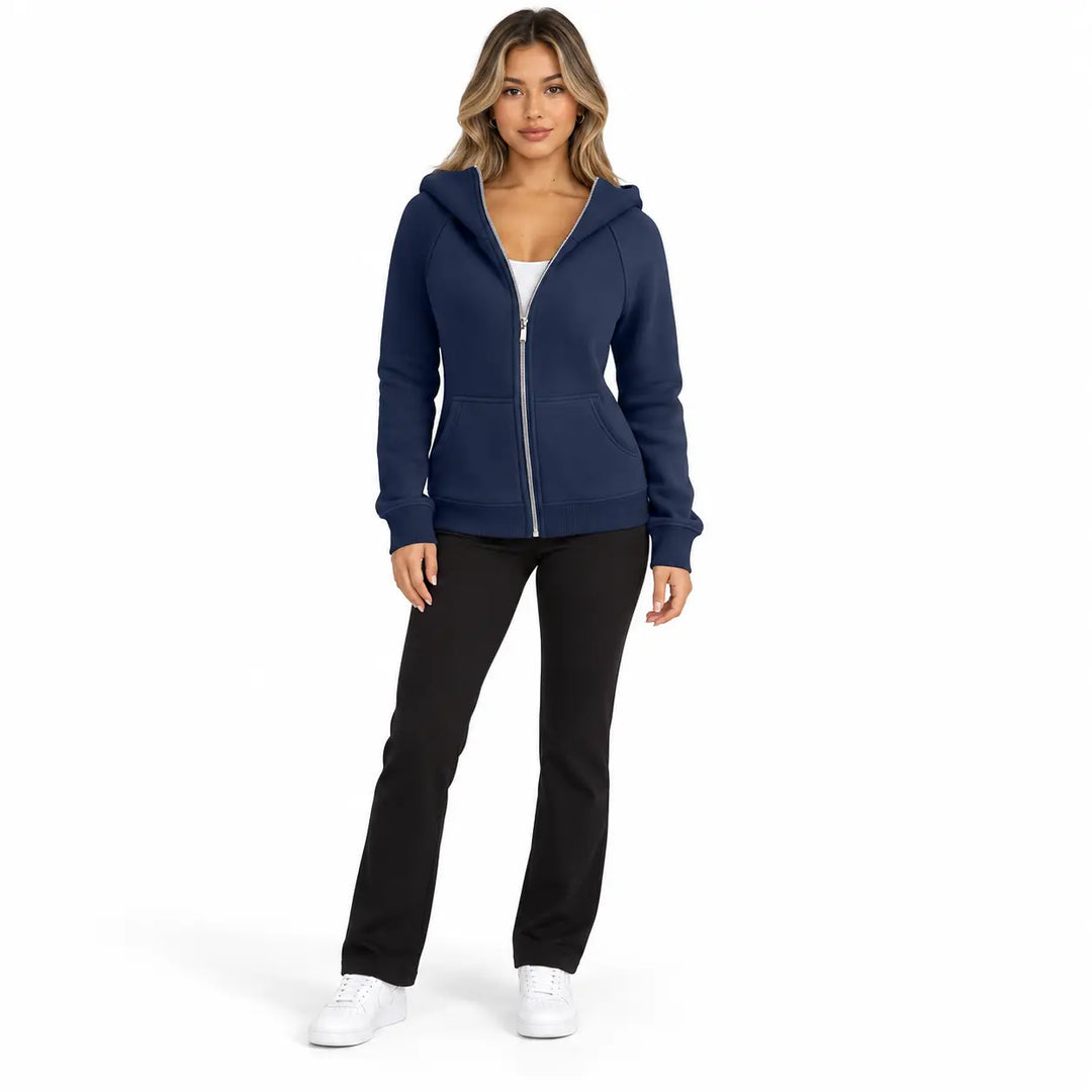 Full-body model wearing the Navy Blue zip hoodie, showing pouch pockets, long sleeves and ribbed trim, on a white background.