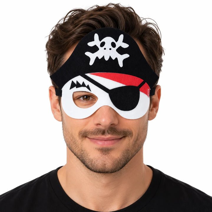 Adult male model wearing a pirate felt eye mask with captain hat, red bandana and black eye patch against a white background.