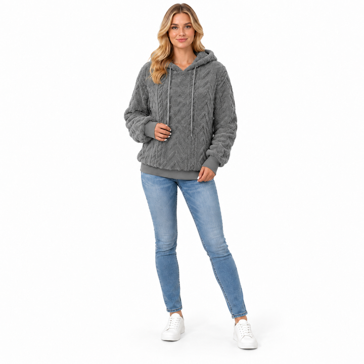 Gray textured hoodie on a model, shown full length on a white background. The textured fabric is shown in this product image.