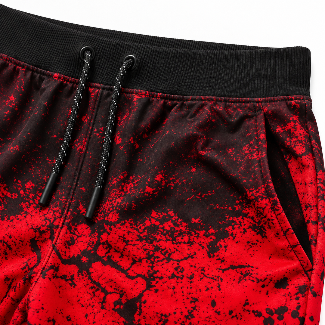 Close-up of Red shorts waistband, drawstring and pocket detail