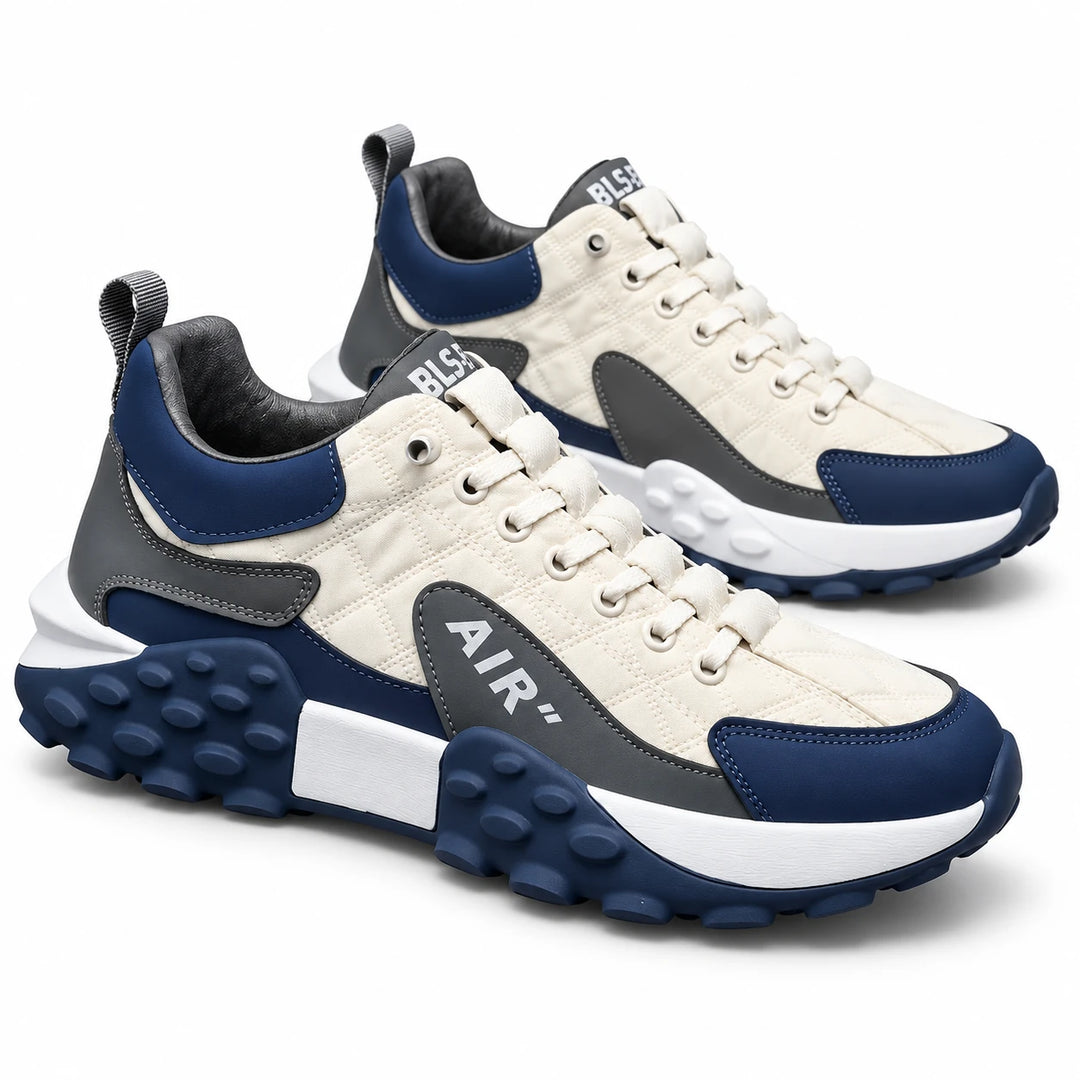 White and Navy sneakers shown as one pair with lace-up fronts, gray AIR side panels and sculpted soles on a white background.