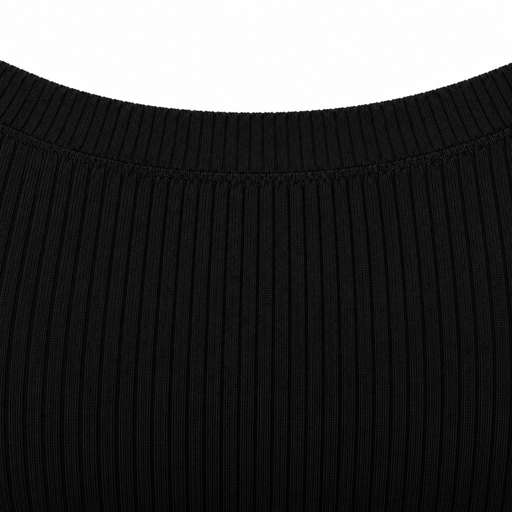 Close-up of the neckline seam and vertical rib texture on the black crop top