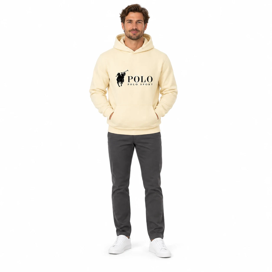 Full-length male model wearing a Cream graphic hoodie with a front pouch on a white studio background