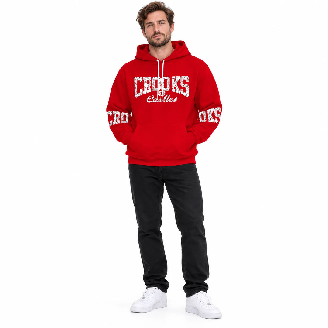 Full-length male model wearing a Red graphic hoodie with chest and sleeve prints on a white studio background