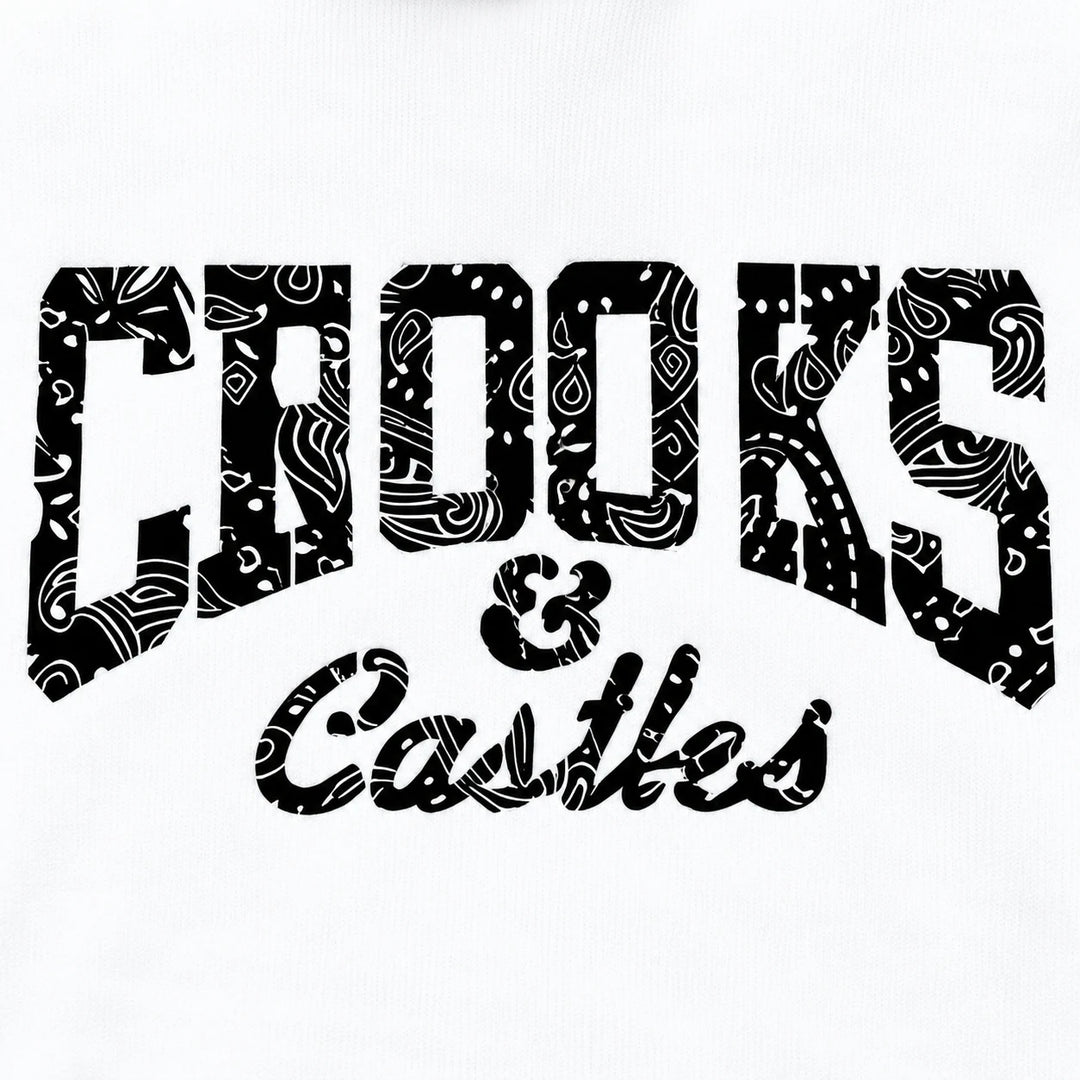 Close-up of black patterned chest lettering on the white hoodie