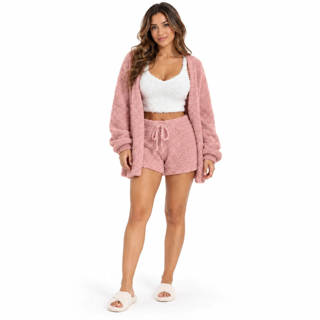 Full-body model wearing a dusty rose lounge coat and shorts with a white cropped vest, front view on white studio background.