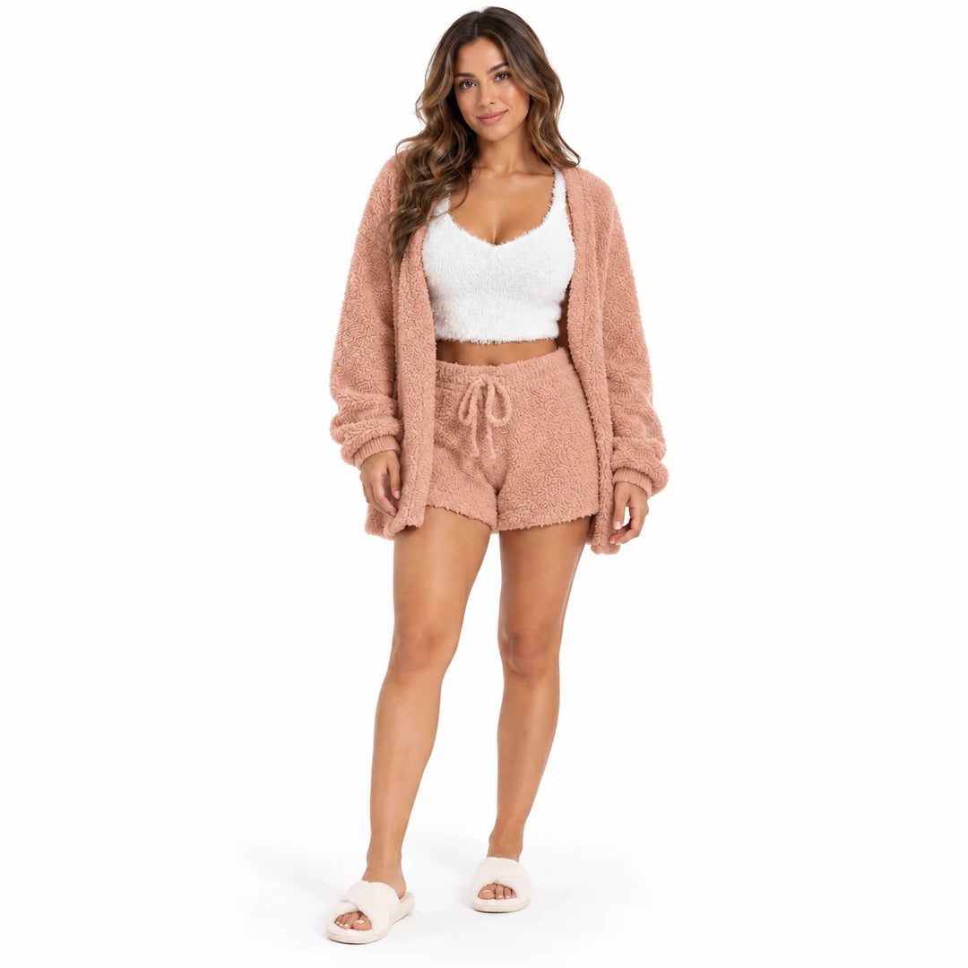 Full-body model in peach lounge coat and drawstring shorts with a white cropped vest, front view on a plain white background.