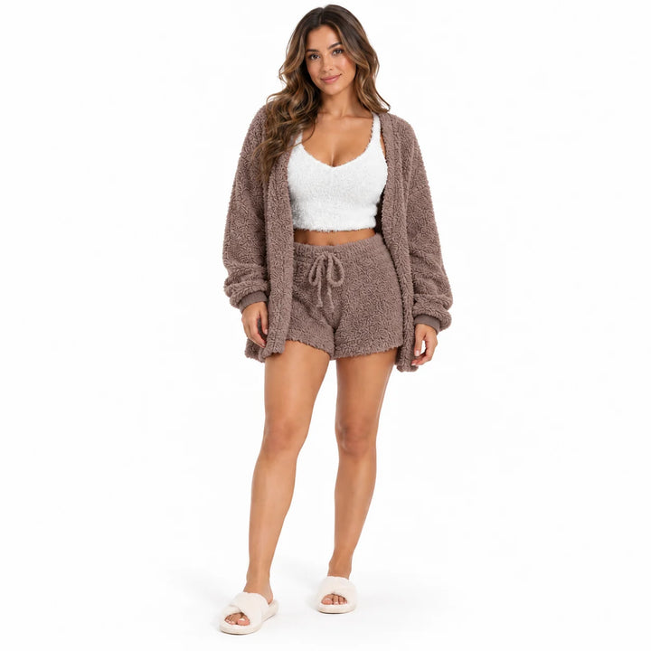 Full-body model in taupe lounge coat and drawstring shorts with a white cropped vest, front view on a plain white background.