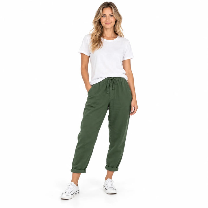 Army Green drawstring ankle pants worn by an adult woman, showing the ankle length and drawstring, in a white studio setting.