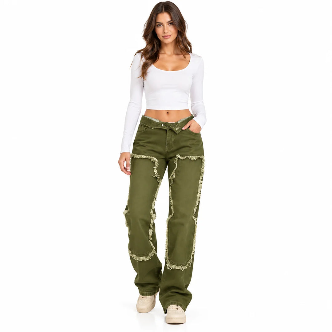 Olive Green jeans on a full-body model in a relaxed front stance, showing the printed panel outlines and wide-leg silhouette.