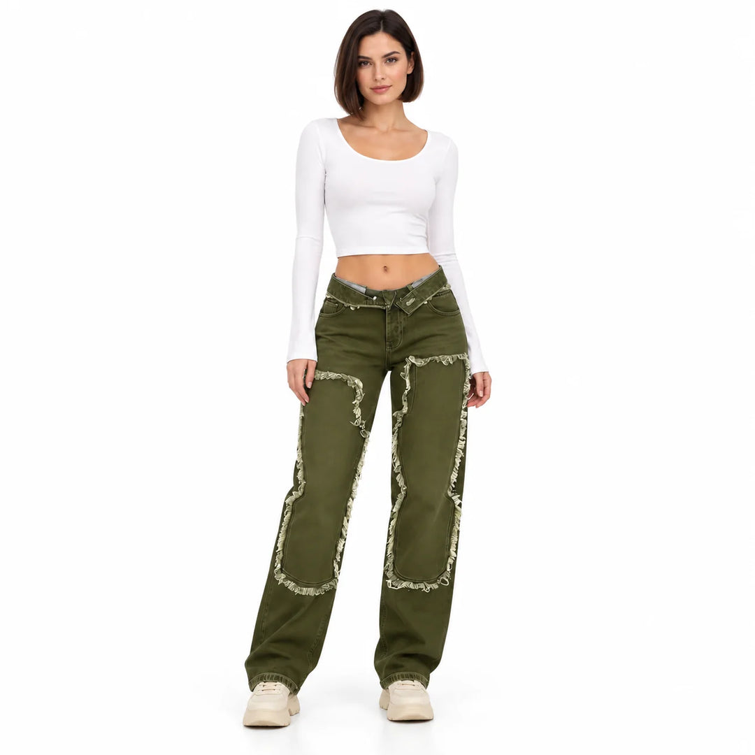 Olive Green jeans on a second adult model with a short dark bob, showing the full front design and cream shoes on clean white