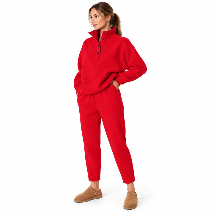 Red matching set with a buttoned stand collar, shown on an adult model in a three-quarter pose against a pure white backdrop.