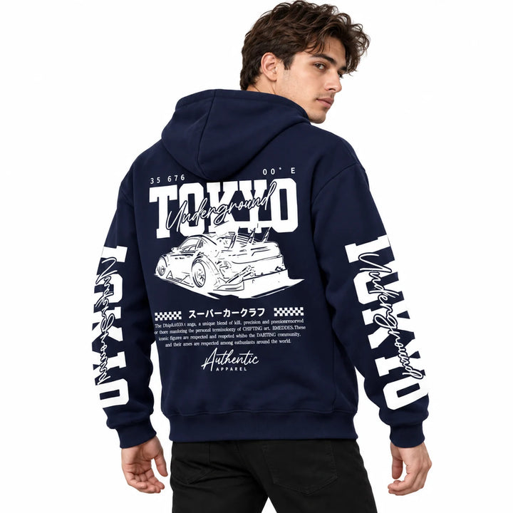 Male model wearing Navy Blue Tokyo racing graphic hoodie, showing back artwork and sleeve prints
