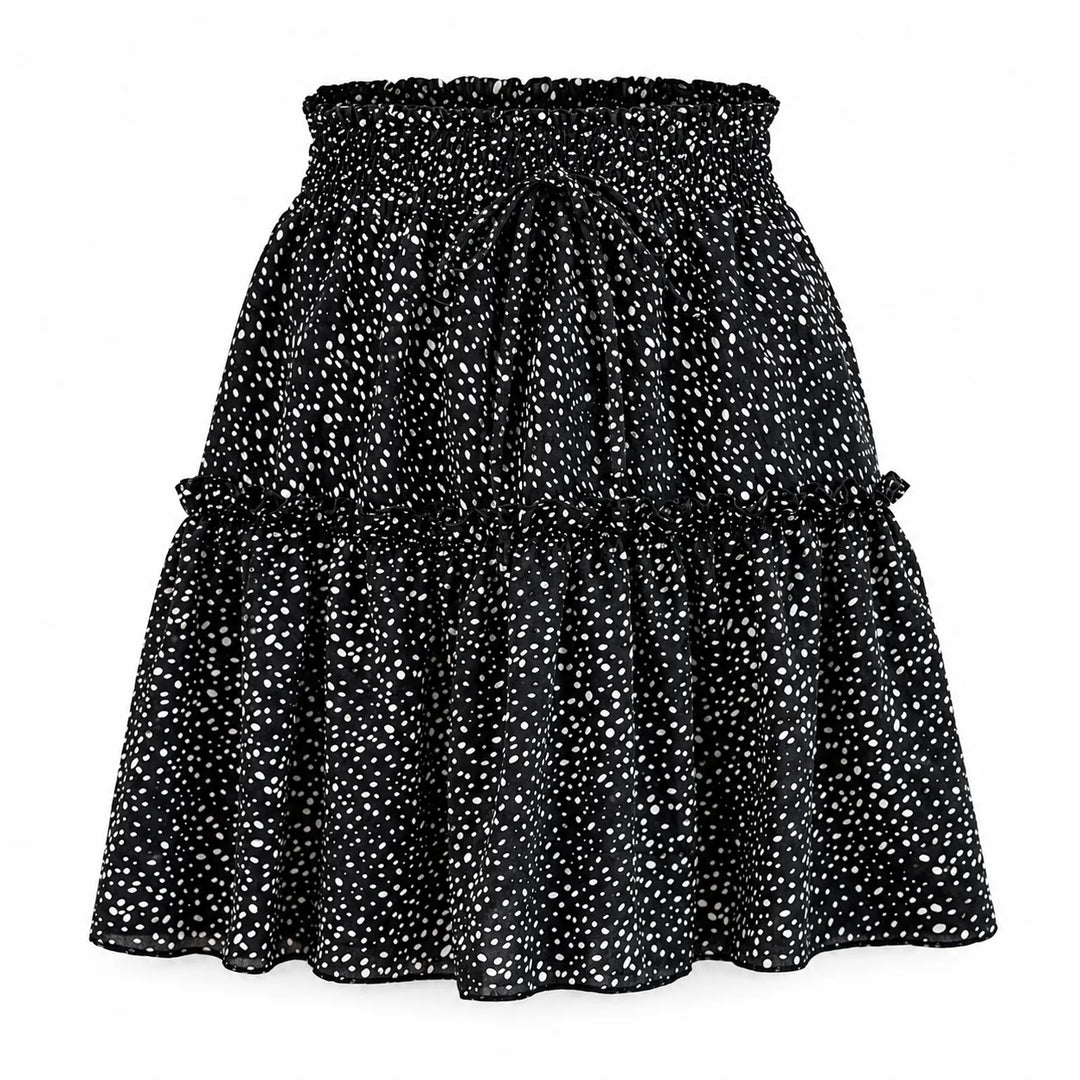Black polka dot chiffon skirt shown from the front on a white background