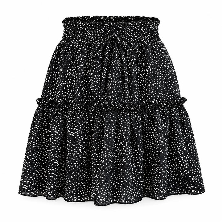 Black polka dot chiffon skirt shown from the front on a white background