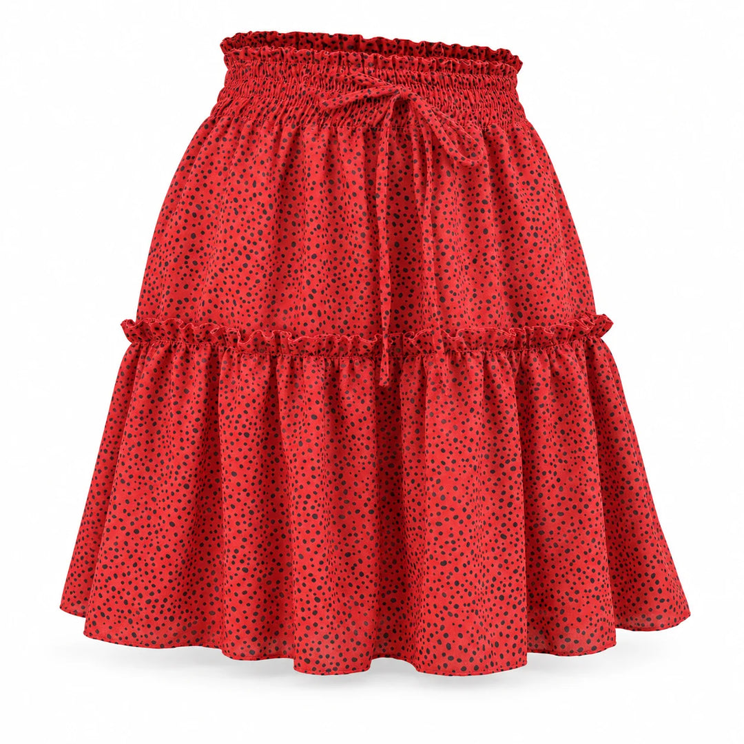 Red printed chiffon skirt with a front tie and ruffled tier shown at a three-quarter angle