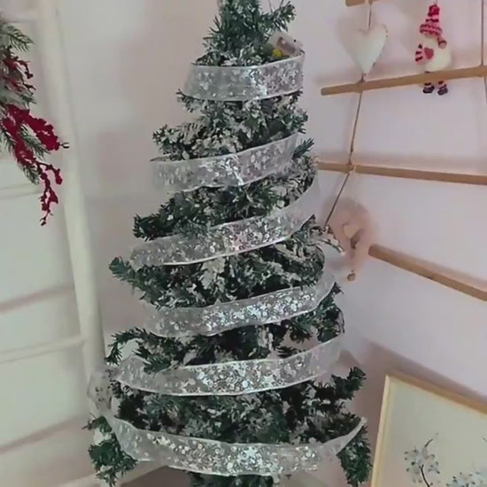 Window frame lined with fairy lights ribbon – warm indoor shine

