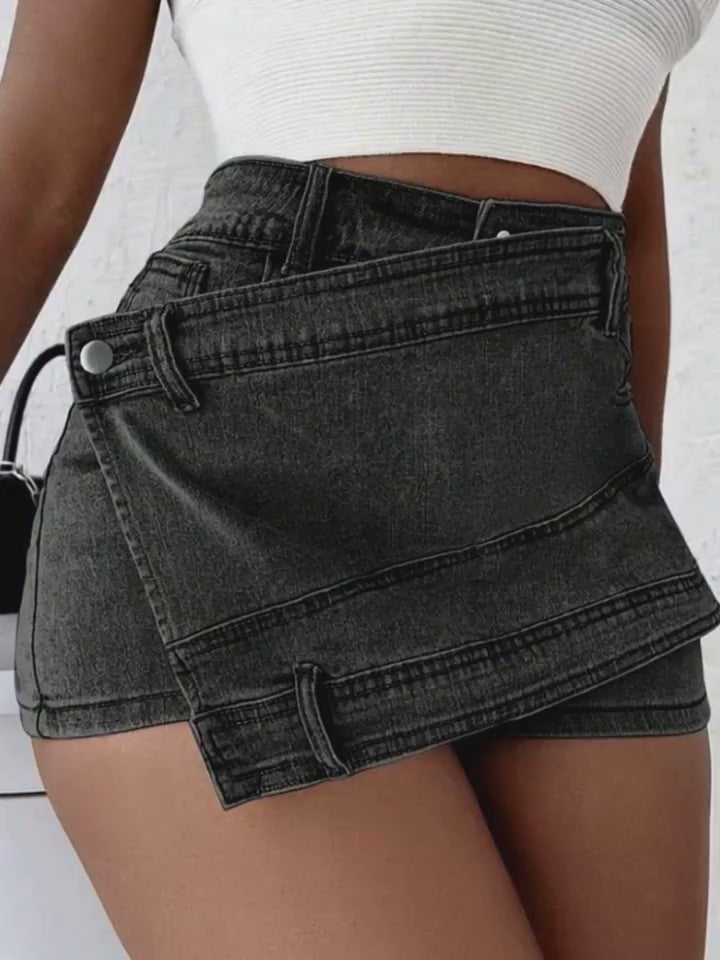 “Night-out glam: leather jacket paired with Asymmetric Denim Skorts”


