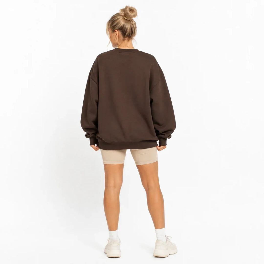 Coffee Brown printed sweatshirt for women shown from the back with oversized relaxed crew neck fit.