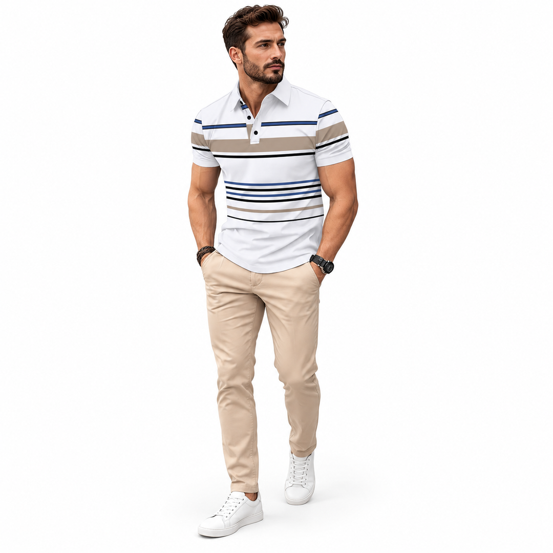 White striped polo styled with beige trousers and white shoes on a standing model.