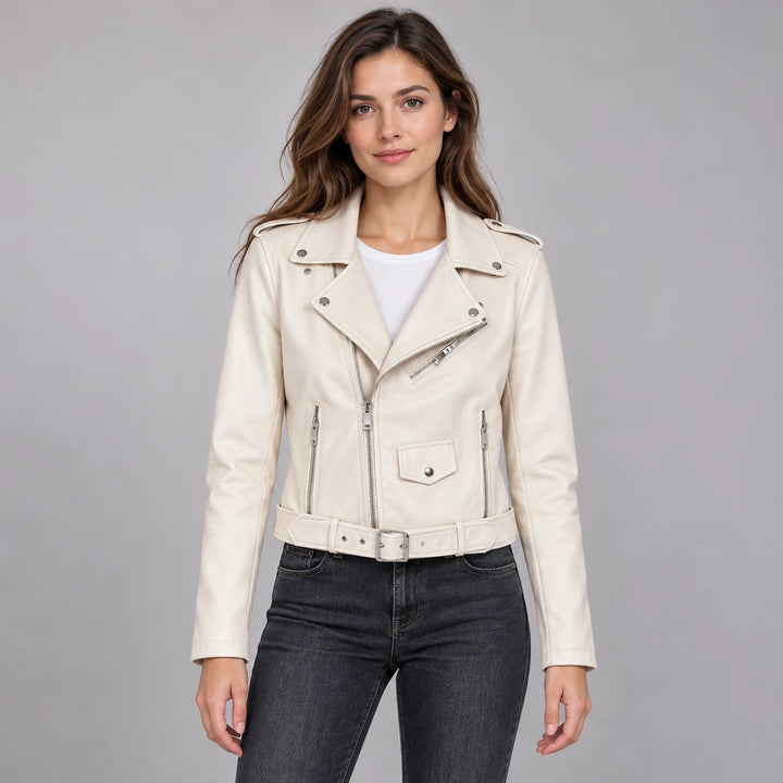 Model wearing the White belted jacket over a white top and dark jeans, with the jacket, lapels, long sleeves and belt visible