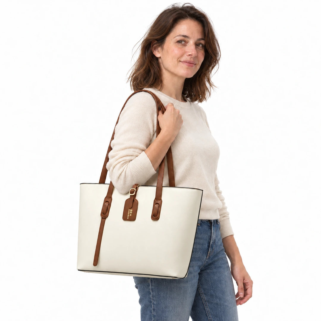 Model carrying the Beige White PU bucket shoulder bag with brown handles