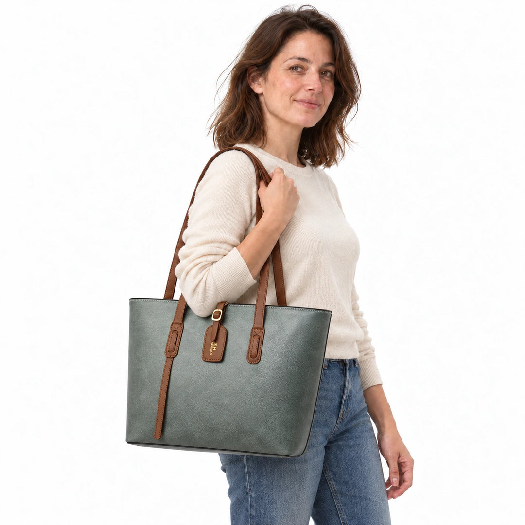 Model carrying the Gray Green PU bucket shoulder bag with brown handles