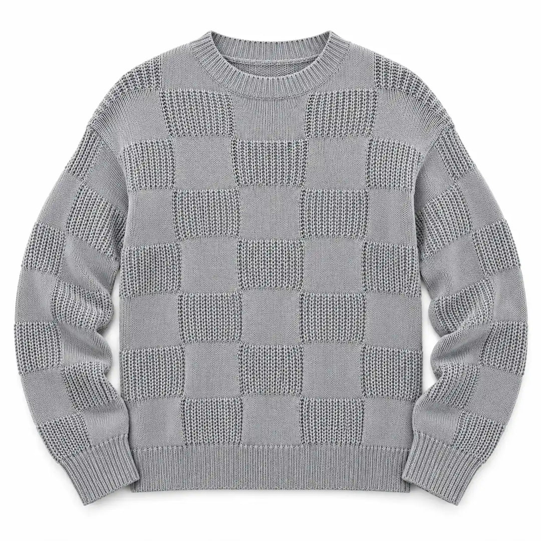Gray checkerboard knit sweater with openwork panels, shown flat on a white background