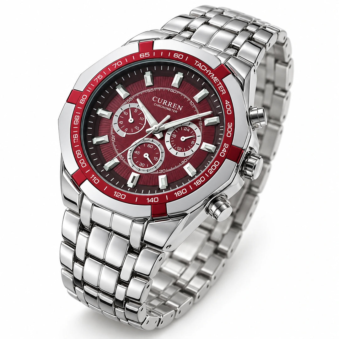 Angled view of the CURREN 8084 watch with a red dial and bezel, silver case and steel bracelet.