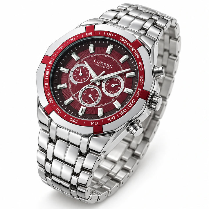 Angled view of the CURREN 8084 watch with a red dial and bezel, silver case and steel bracelet.