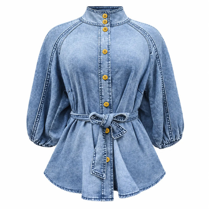 Front product view of the Washed Blue T0308 blouse, with yellow buttons, stand collar, gathered puff sleeves and a tied belt.