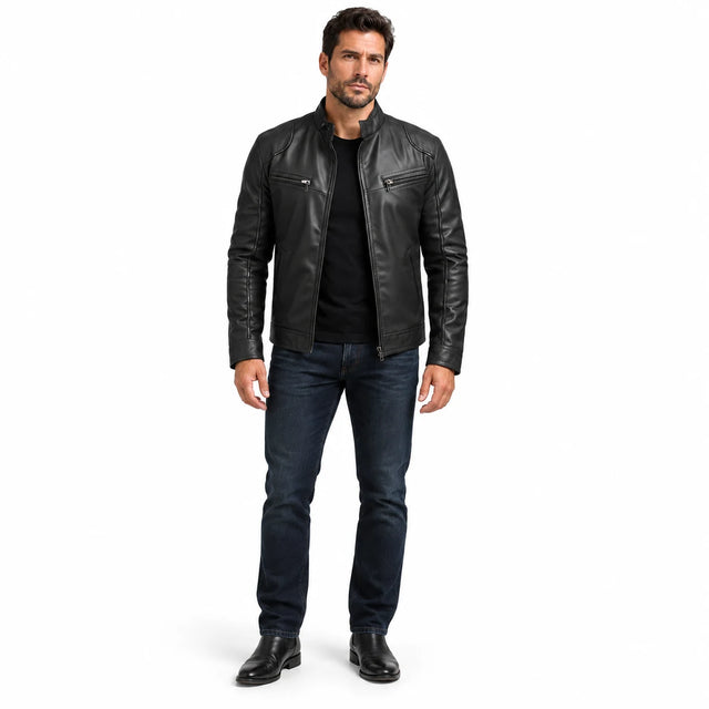Men's faux leather jacket in black, front view on a full-body male model with a black tee and dark jeans on a white backdrop.
