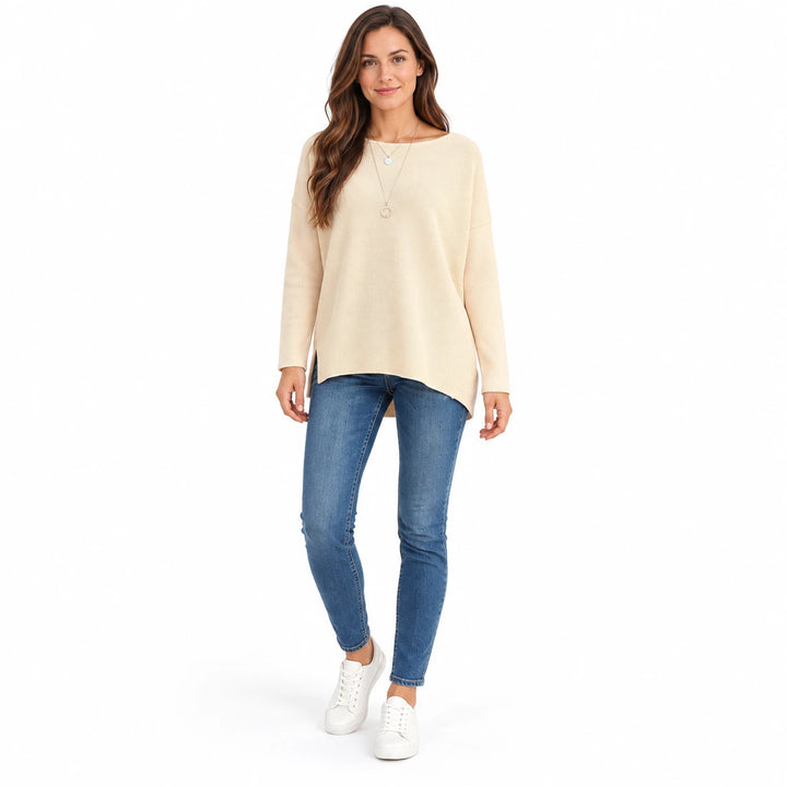 Adult woman wearing the Apricot batwing sleeve pullover, in a full-length front view against a plain white studio background.
