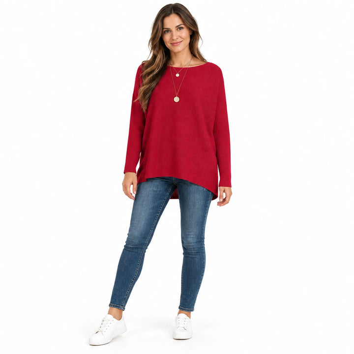 Adult woman shown wearing the Red batwing sleeve pullover, in a full-body front view against a plain white studio background.