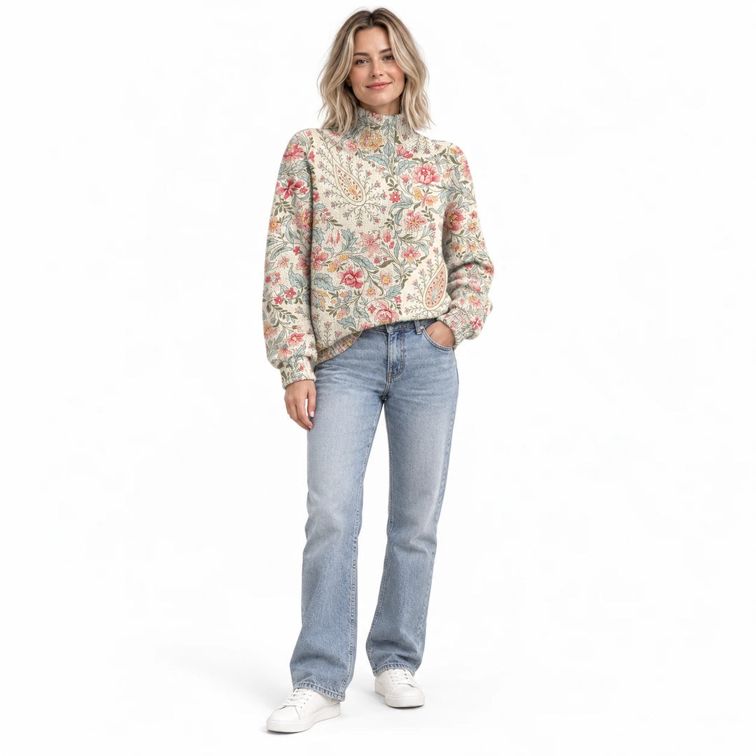 Adult woman wearing the printed high-neck pullover in the Lilac design, in a full-body front view against a white background.