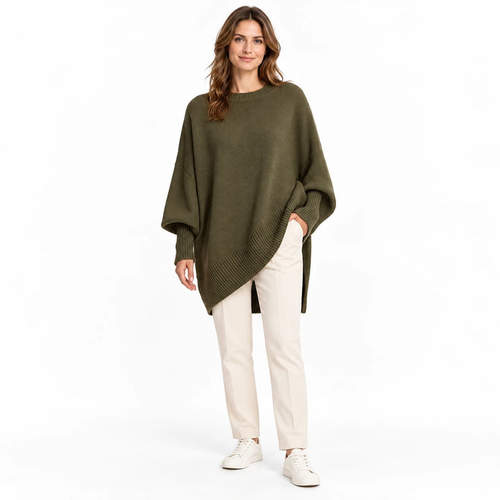Adult woman wearing the Dark Green round-neck draped pullover, in a full-length front view against a white studio background.