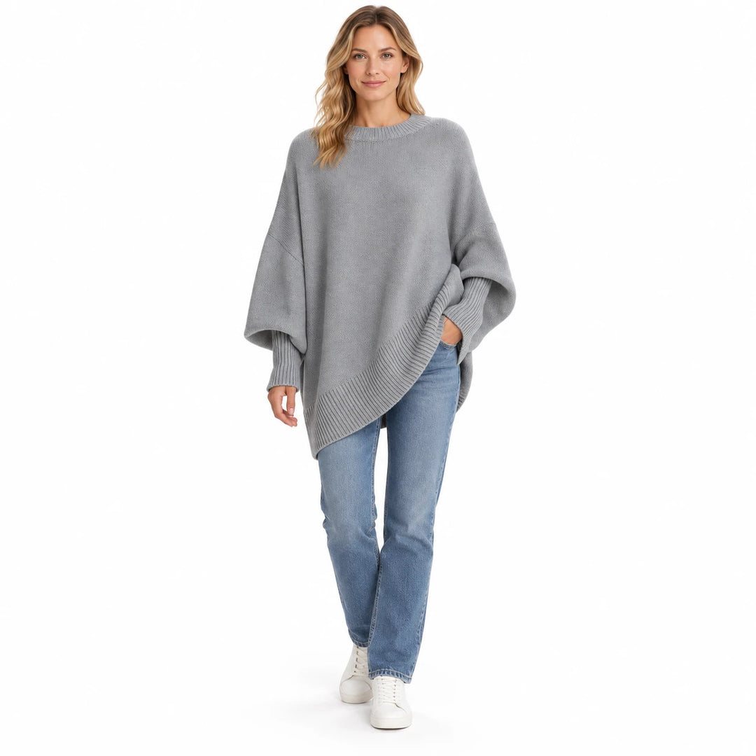Adult woman wearing the Light Gray round-neck draped pullover, in a full-length front view against a white studio background.