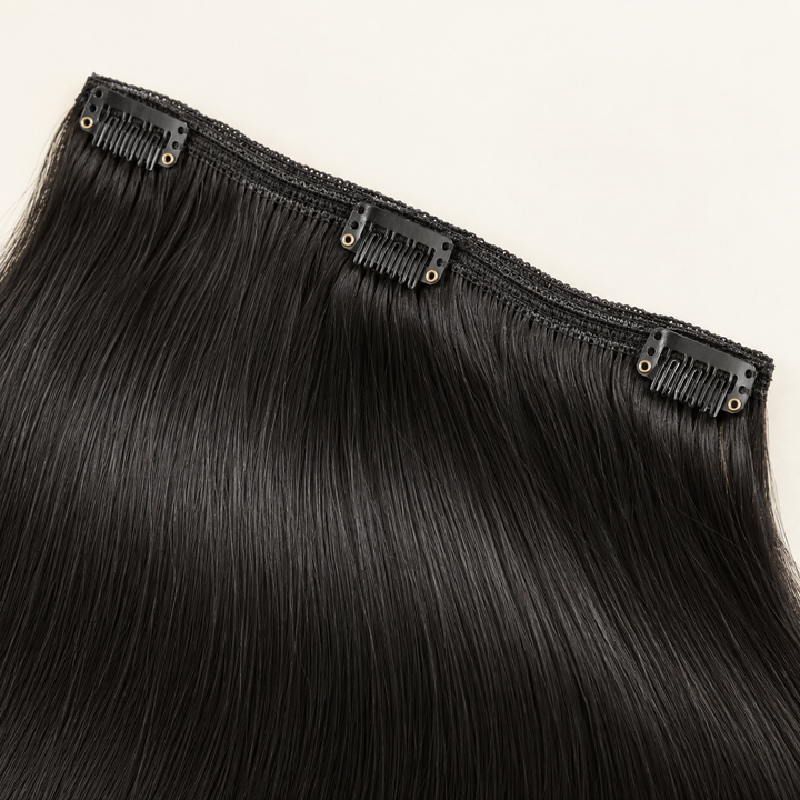 Close-up of black clip-in hair extension attachment — AI-generated styling illustration