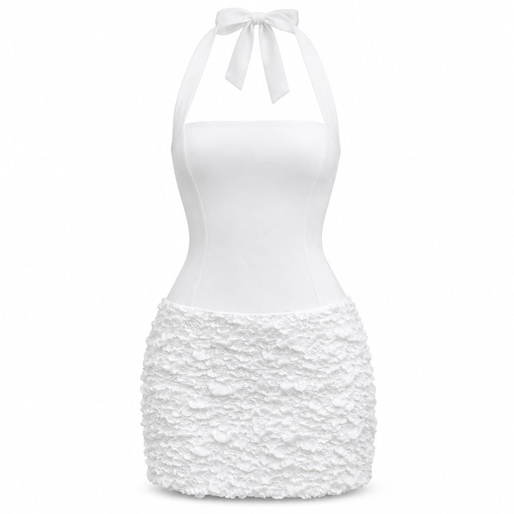 White halter mini dress with a smooth fitted bodice and textured skirt on a white background.
