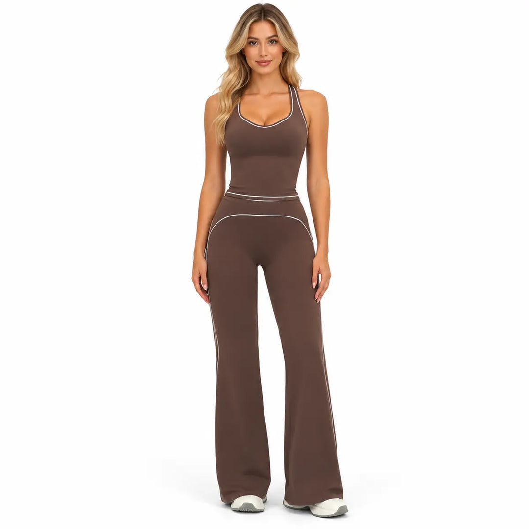 Dark Chocolate Brown two-piece outfit on a full-body model with contrast piping at the neckline, waist and flared pant seams.
