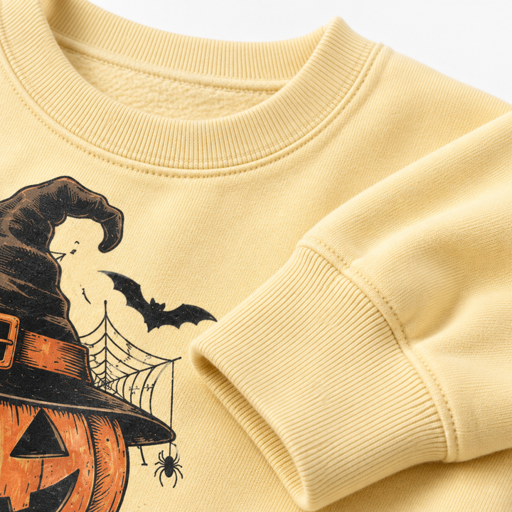 Close-up of ring-spun cotton polyester sweatshirt surface with visible seams and ribbed trim around the garment details view.