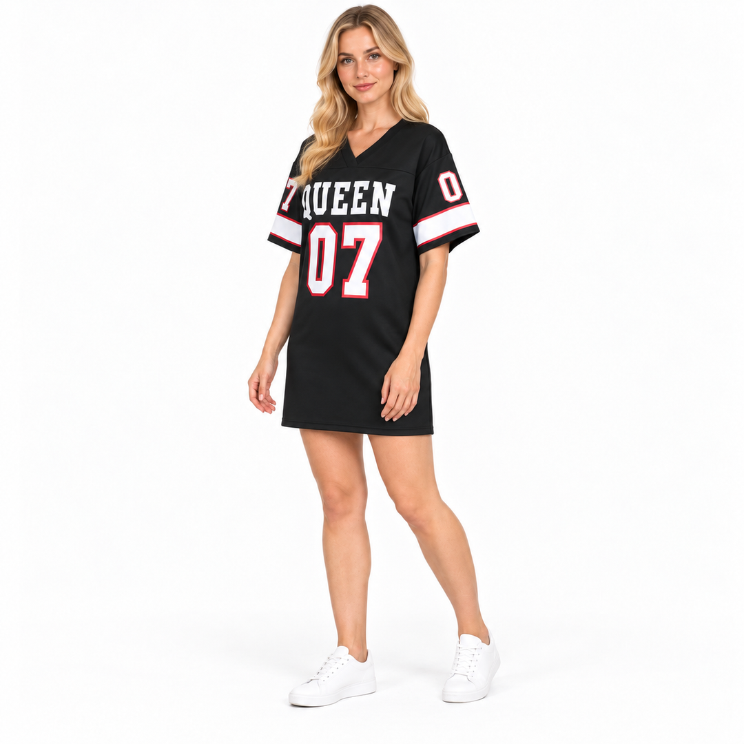 Three-quarter model view of the black QUEEN 07 dress on a clean white studio background.