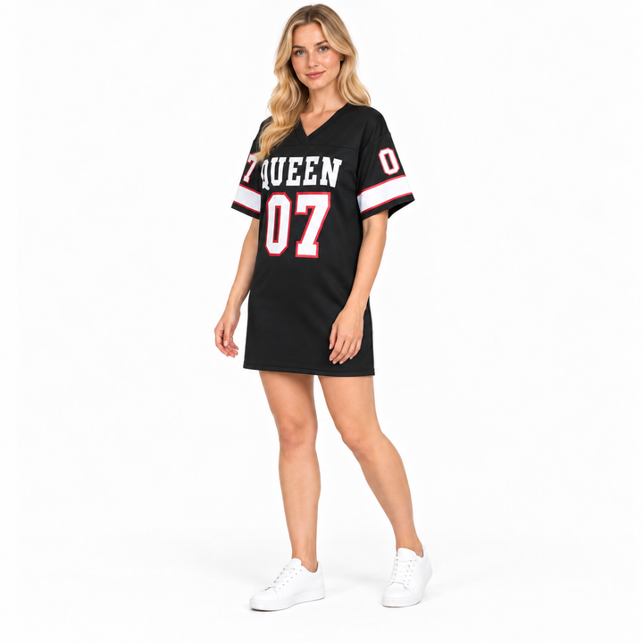 Three-quarter model view of the black QUEEN 07 dress on a clean white studio background.