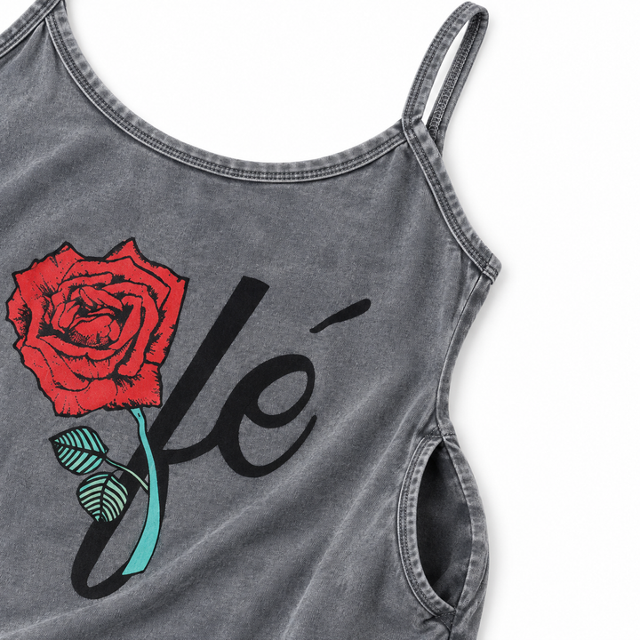 Close-up of the gray dress neckline, thin spaghetti strap, faded stitching and one side pocket