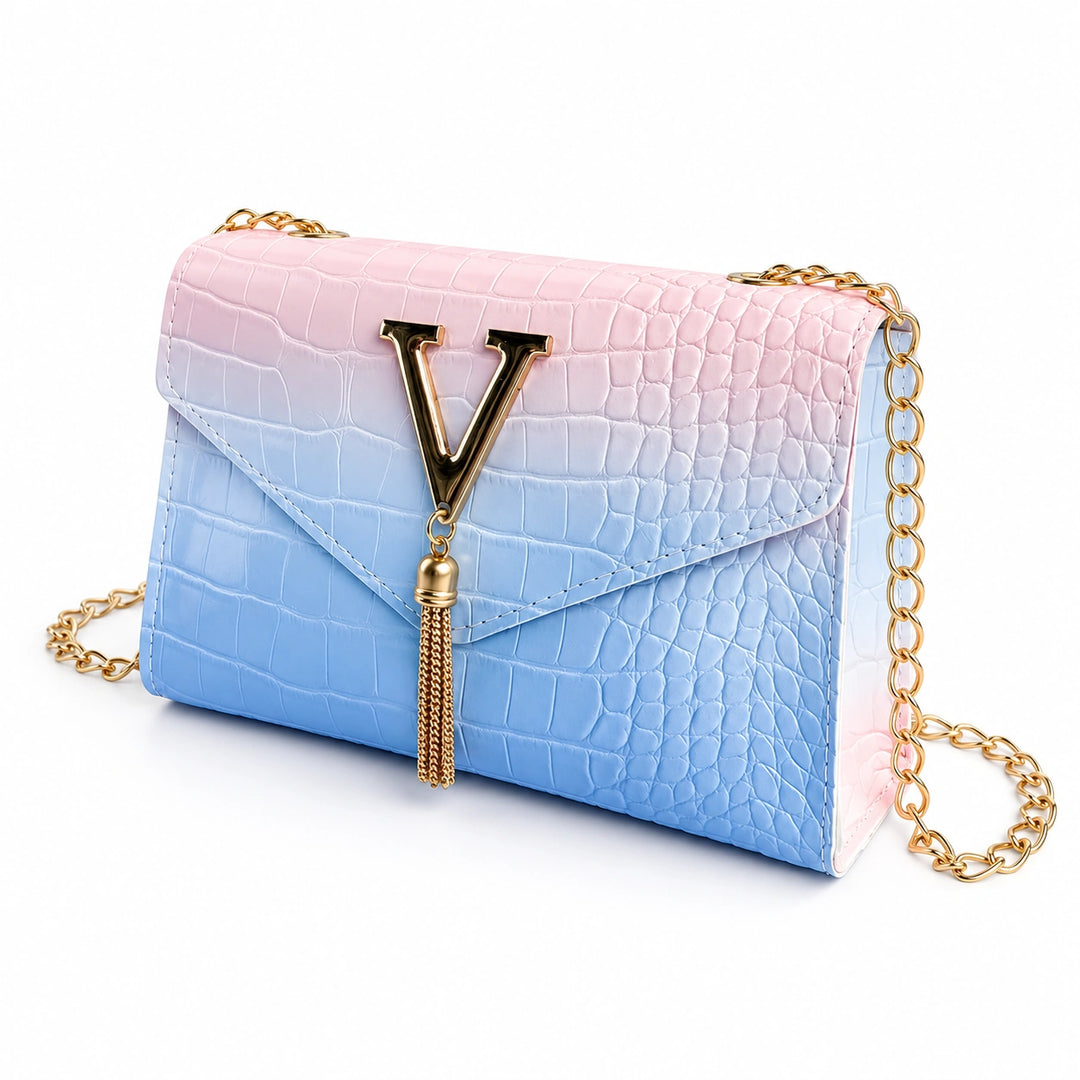 Three-quarter view of the pastel blue chain bag showing flap and side depth