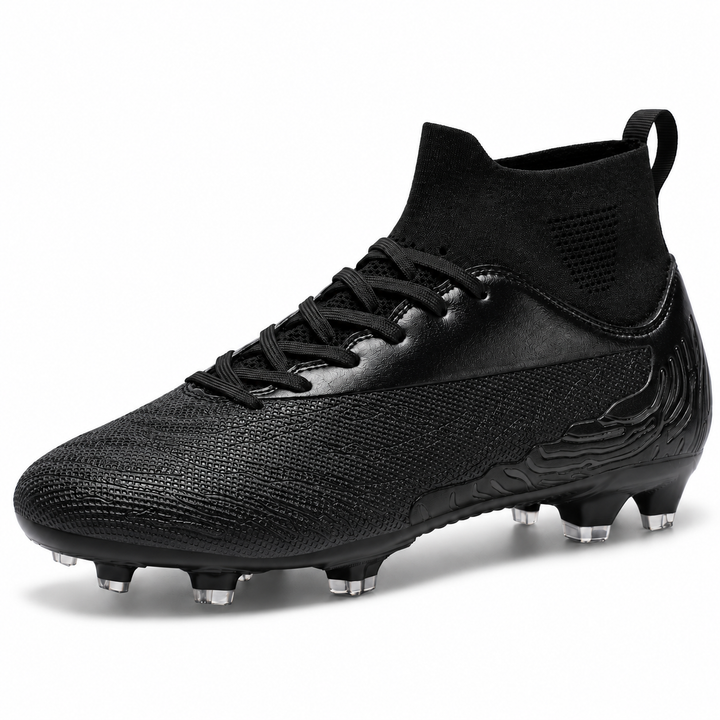 All-black soccer cleat in a three-quarter studio view with textured forefoot, lace closure, ankle collar and molded studs.