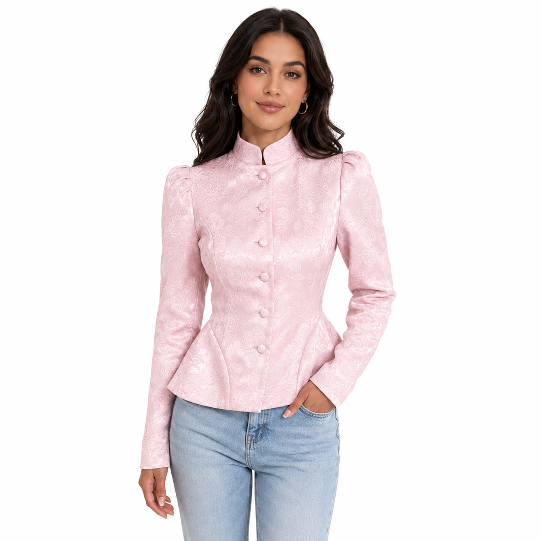 Soft pink stand collar blazer for women with floral jacquard texture, covered buttons, long sleeves and fitted waist styling.