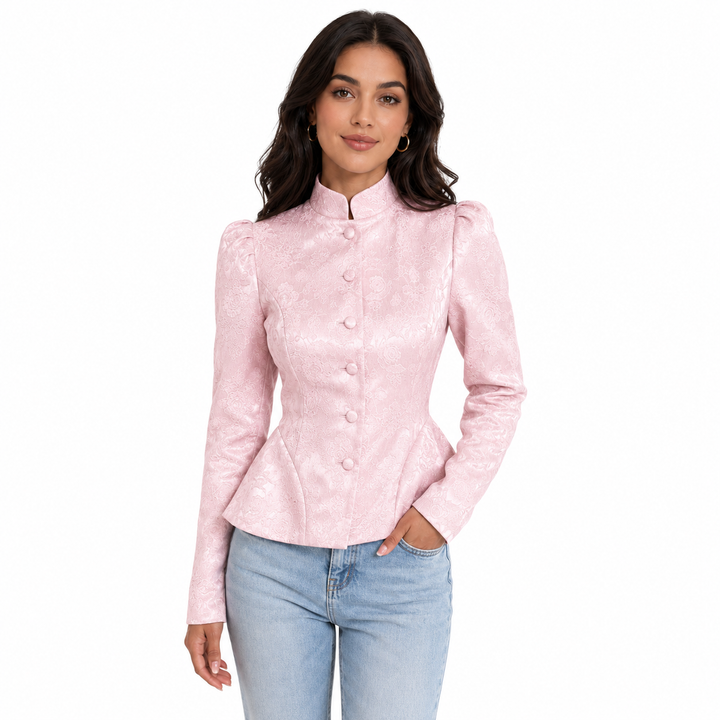 Soft pink stand collar blazer for women with floral jacquard texture, covered buttons, long sleeves and fitted waist styling.